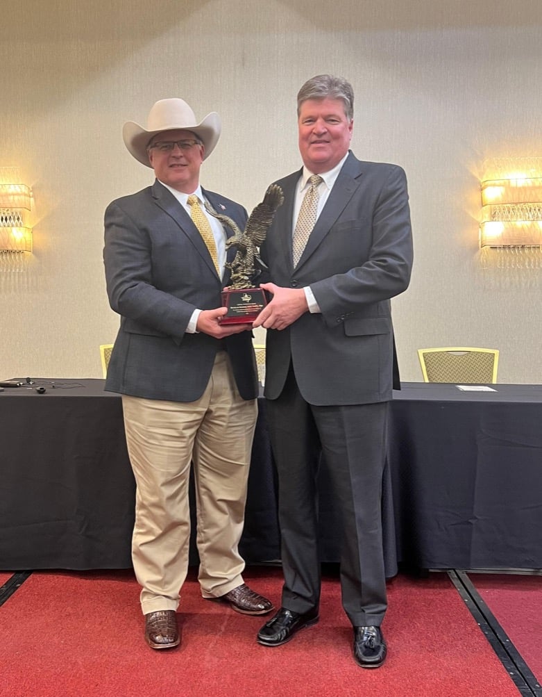 NAIFA-Texas National Committeeperson, Jason Talley presents Doug Massey with the Lifetime Achievement Award